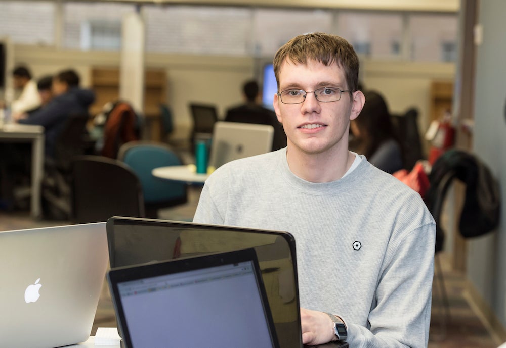 Student sitting at a computer