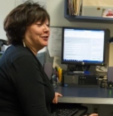 person sitting at a computer